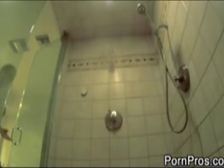 Busty blond in shower voyeur cam